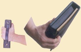 Slimline Notebook Holster - side and top view, held